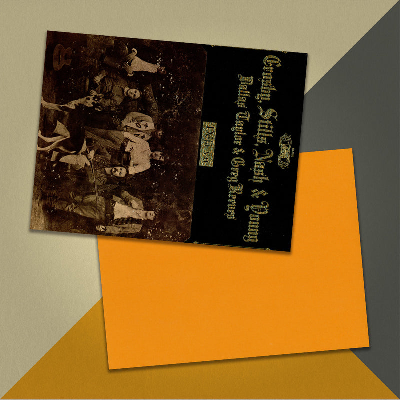 Photo of a 11” x 8.5” notebook cover made from an upcycled Crosby, Stills, Nash & Young "Déjà Vu" album sleeve and the back cover with coral cardstock on an orange, cream and grey background.