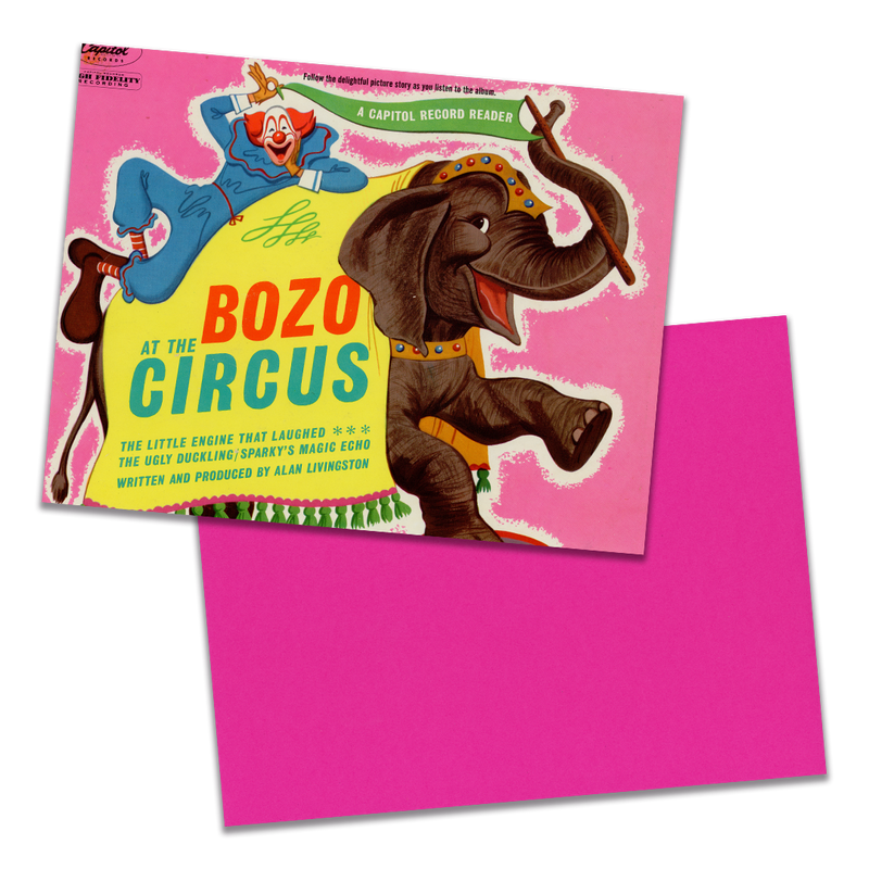 Photo of a 11” x 8.5” notebook cover made from an upcycled Pinto Colvig, Billy May “Bozo At The Circus” album sleeve and the back cover with hot pink cardstock on a transparent background.