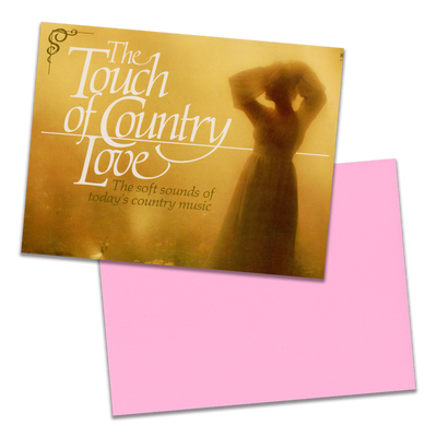 Photo of a 11” x 8.5” notebook cover made from an upcycled Various “The Touch Of Country Love” album sleeve and the back cover with pink cardstock on a transparent background.