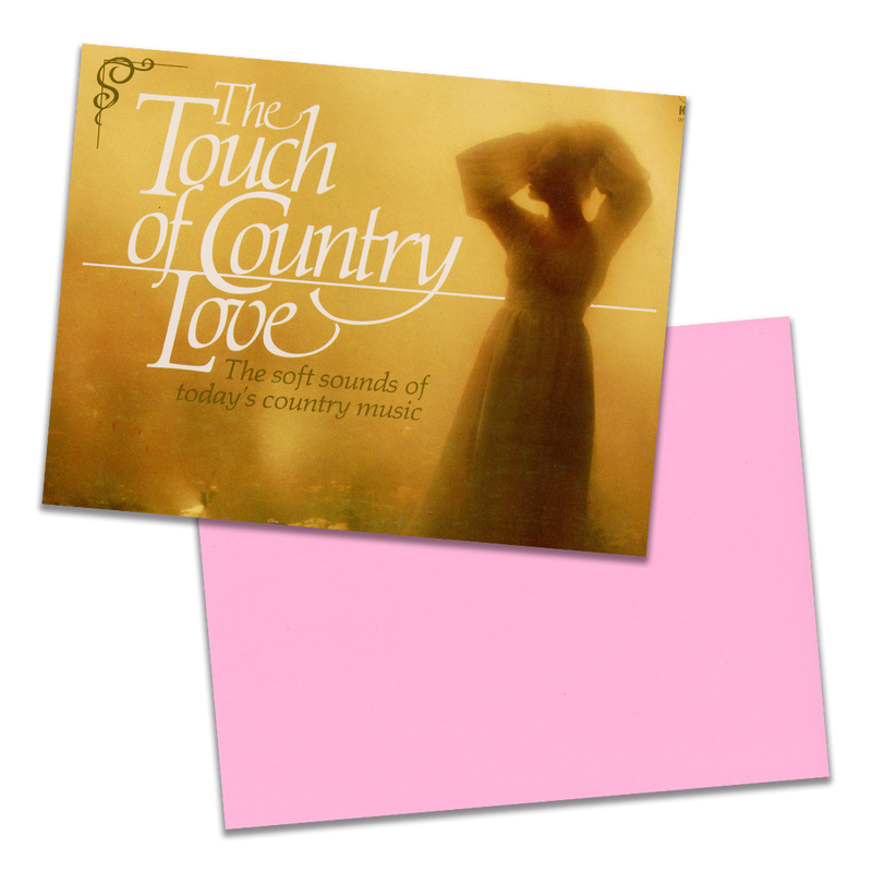 Photo of a 11” x 8.5” notebook cover made from an upcycled Various “The Touch Of Country Love” album sleeve and the back cover with pink cardstock on a transparent background.