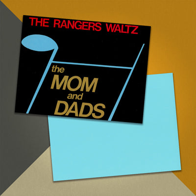 Photo of a 11” x 8.5” notebook cover made from an upcycled The Mom And Dads “The Rangers Waltz” album sleeve and the back cover with aqua cardstock on an orange, cream and grey background.