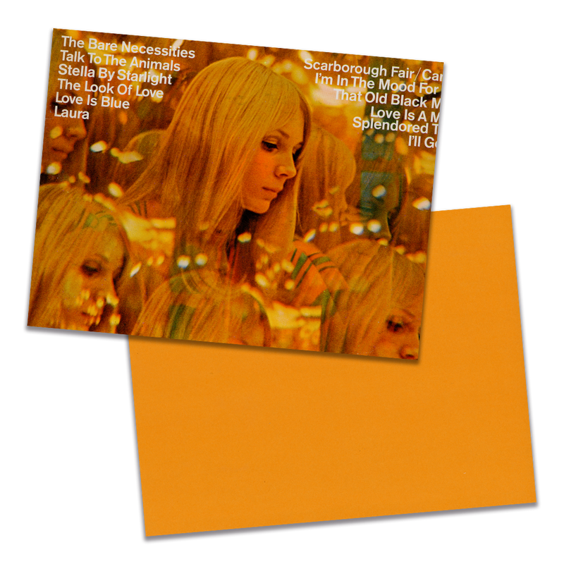 Photo of a 11” x 8.5” notebook cover made from an upcycled Andre Kostelanetz And His Orchestra “Scarborough Fair And Other Great Movie Hits” album sleeve and the back cover with orange cardstock on a transparent background.