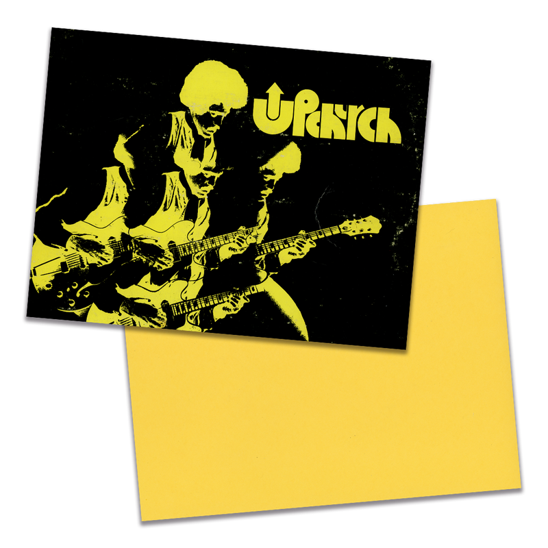 Photo of a 11” x 8.5” notebook cover made from an upcycled Phil Upchurch “Upchurch” album sleeve and the back cover with yellow cardstock on a transparent background.