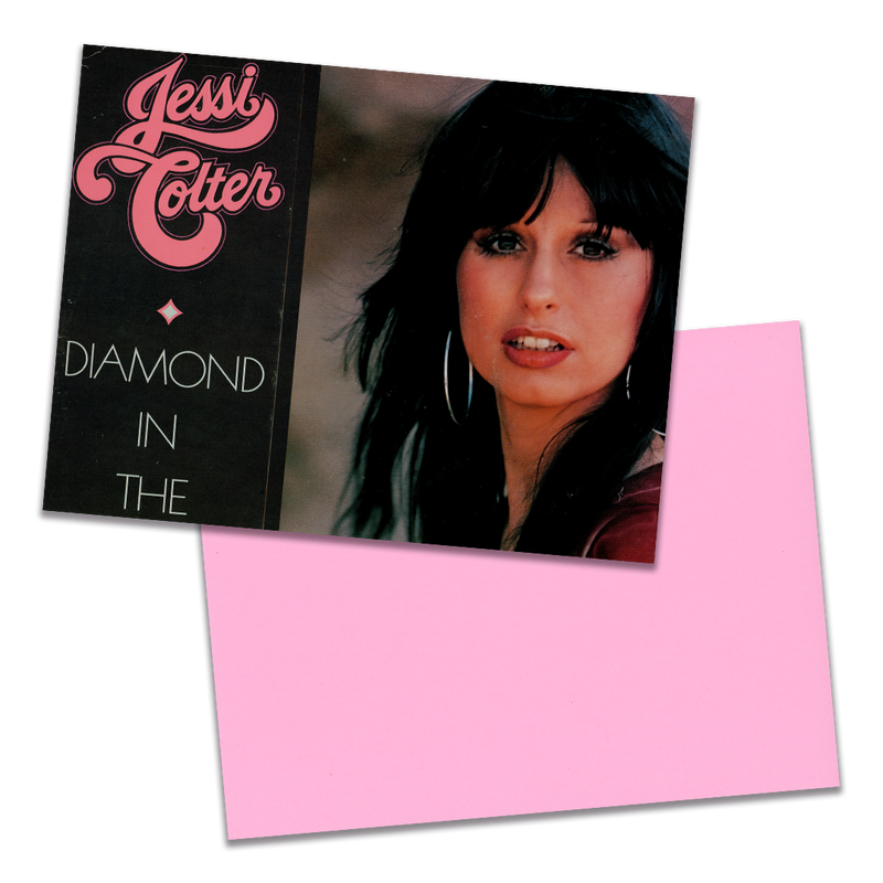 Photo of a 11” x 8.5” notebook cover made from an upcycled Jessi Colter “Diamond in the Rough” album sleeve and the back cover with pink cardstock on a transparent background.