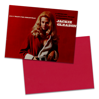 Photo of a 11” x 8.5” notebook cover made from an upcycled Jackie Gleason “All I Want For Christmas” album sleeve and the back cover with red cardstock on a transparent background.