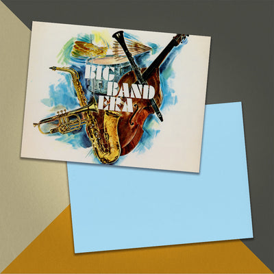 Photo of a 11” x 8.5” notebook cover made from an upcycled Various “Theme Songs Of The Big Band Era” album sleeve and the back cover with light blue cardstock on an orange, cream and grey background.