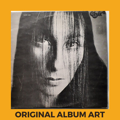 Photo of the cover of the Cher “Cher” album sleeve with the text “Original Album Art” on an orange border around the photo.