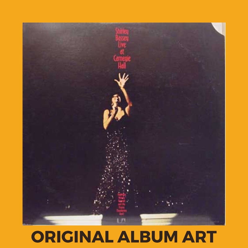 Photo of the cover of the Shirley Bassey “Live At Carnegie Hall” album sleeve with the text “Original Album Art” on an orange border around the photo.