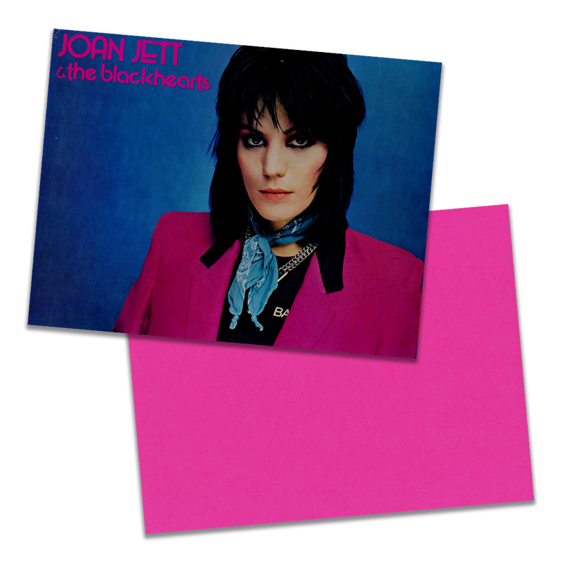 Photo of a 11” x 8.5” notebook cover made from an upcycled Joan Jett & the Blackhearts “I Love Rock ‘N Roll” album sleeve and the back cover with hot pink cardstock on a transparent background.