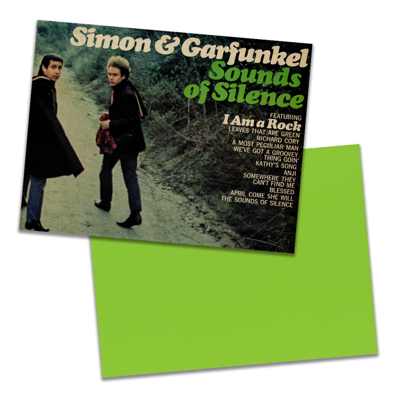 Photo of a 11” x 8.5” notebook cover made from an upcycled Simon & Garfunkel “Sounds of Silence” album sleeve and the back cover with lime green cardstock on a transparent background.