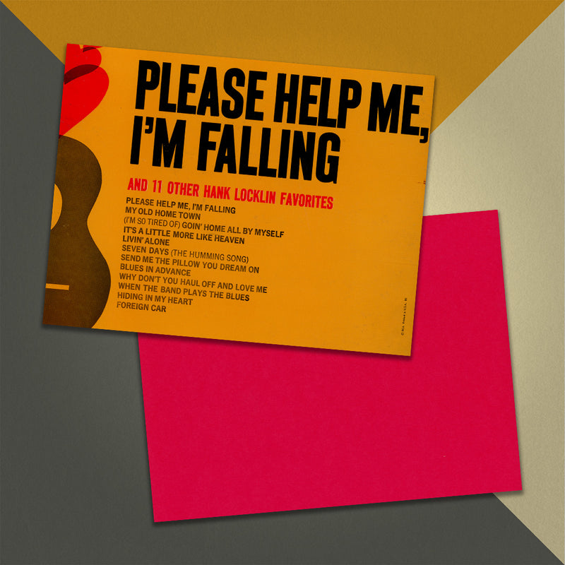 Photo of a 11” x 8.5” notebook cover made from an upcycled Hank Locklin “Please Help Me, I’m Falling” album sleeve and the back cover with red cardstock on an orange, cream and grey background.