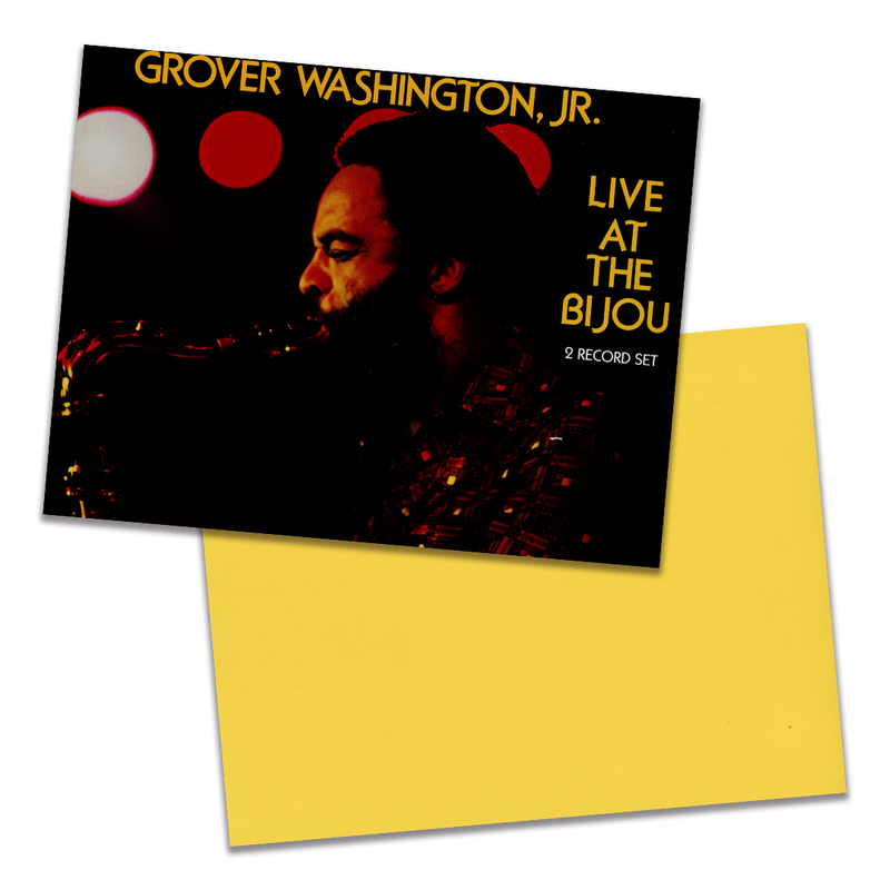 Photo of a 11” x 8.5” notebook cover made from an upcycled Grover Washington, Jr “Live At The Bijou” album sleeve and the back cover with yellow cardstock on a transparent background.