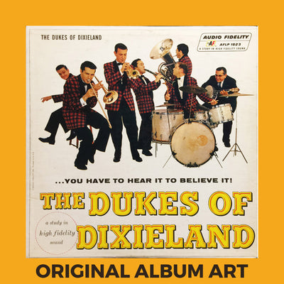 Photo of the cover of the The Dukes Of Dixieland “You Have To Hear It To Believe It!” album sleeve with the text “Original Album Art” on an orange border around the photo.