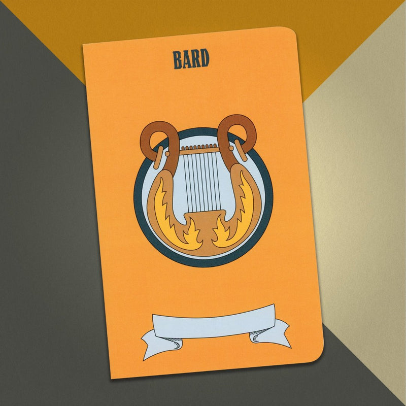 A large bard notebook with a bright orange cover and an illustration of a lyre, cream and grey background.