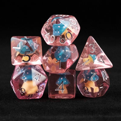 A set of pink polyhedral dice with blue and pink cap mushroom inclusions on a black background.