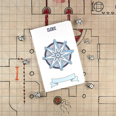 The front cover of a large cleric notebook with a white cover and an illustration of an eight pointed star surrounded by blue energy. The notebook sits on a grid map surrounded by dice.