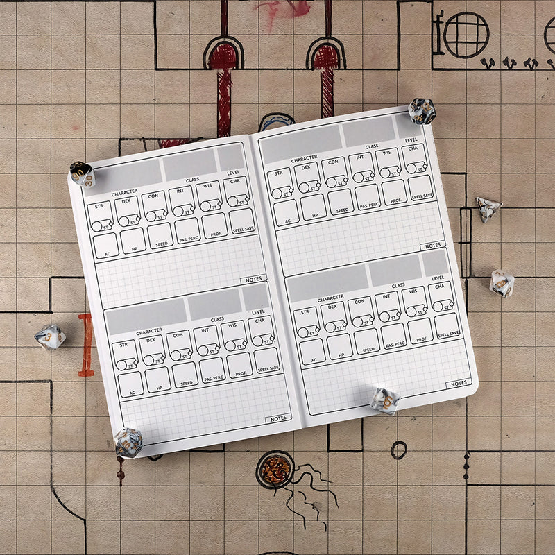 Pages of a Dungeon Master notebook with four blank character sheets on a grid map surrounded by dice.