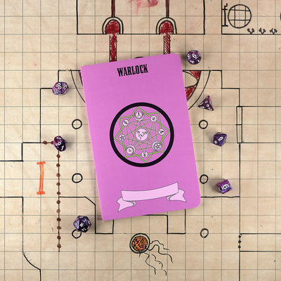 The front cover of a large warlock notebook with a bright purple cover and an illustration of a summoning circle in different shades of purple and bright green. The notebook sits on a grid map surrounded by dice.