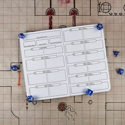 Sixth and seventh pages of the wizard notebook with blank areas for tracking your characters spells. The notebook sits on a grid map surrounded by dice.